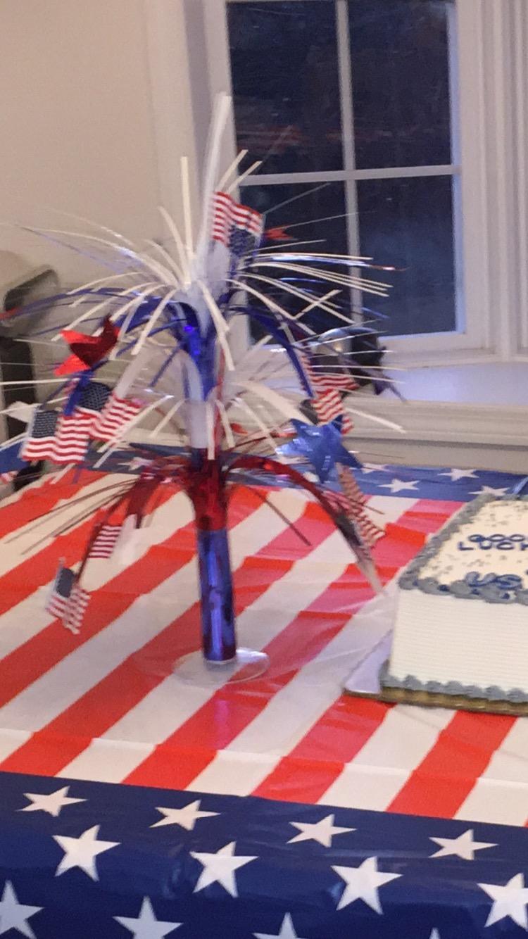 Beistle Patriotic Flag Cascade Centerpiece, Red White and Blue Metallic Decoration with American Flags for 4th of July, Memorial and Veterans Day, and Patriotic Party Tables, 18