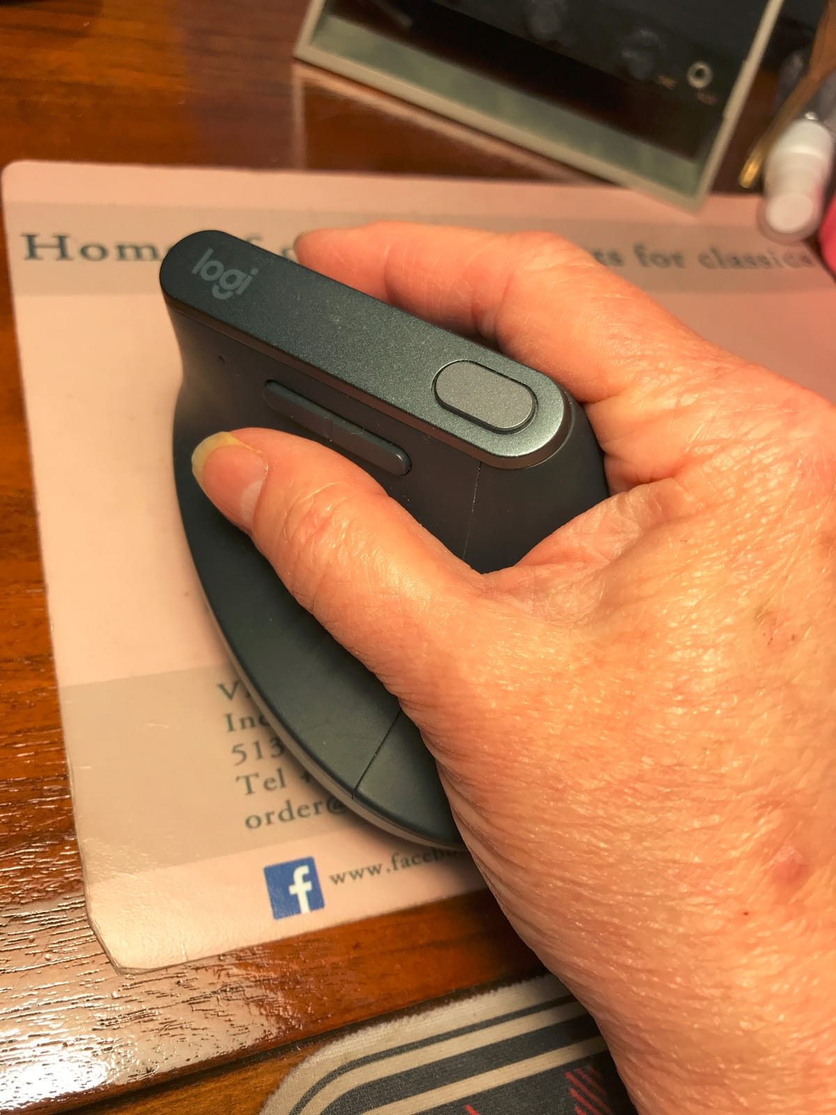 Logitech MX Vertical Wireless Mouse Ergonomic Design - Graphite | Reduces muscle strain, move content between 3 Windows and Apple computers, rechargeable customer photo 1