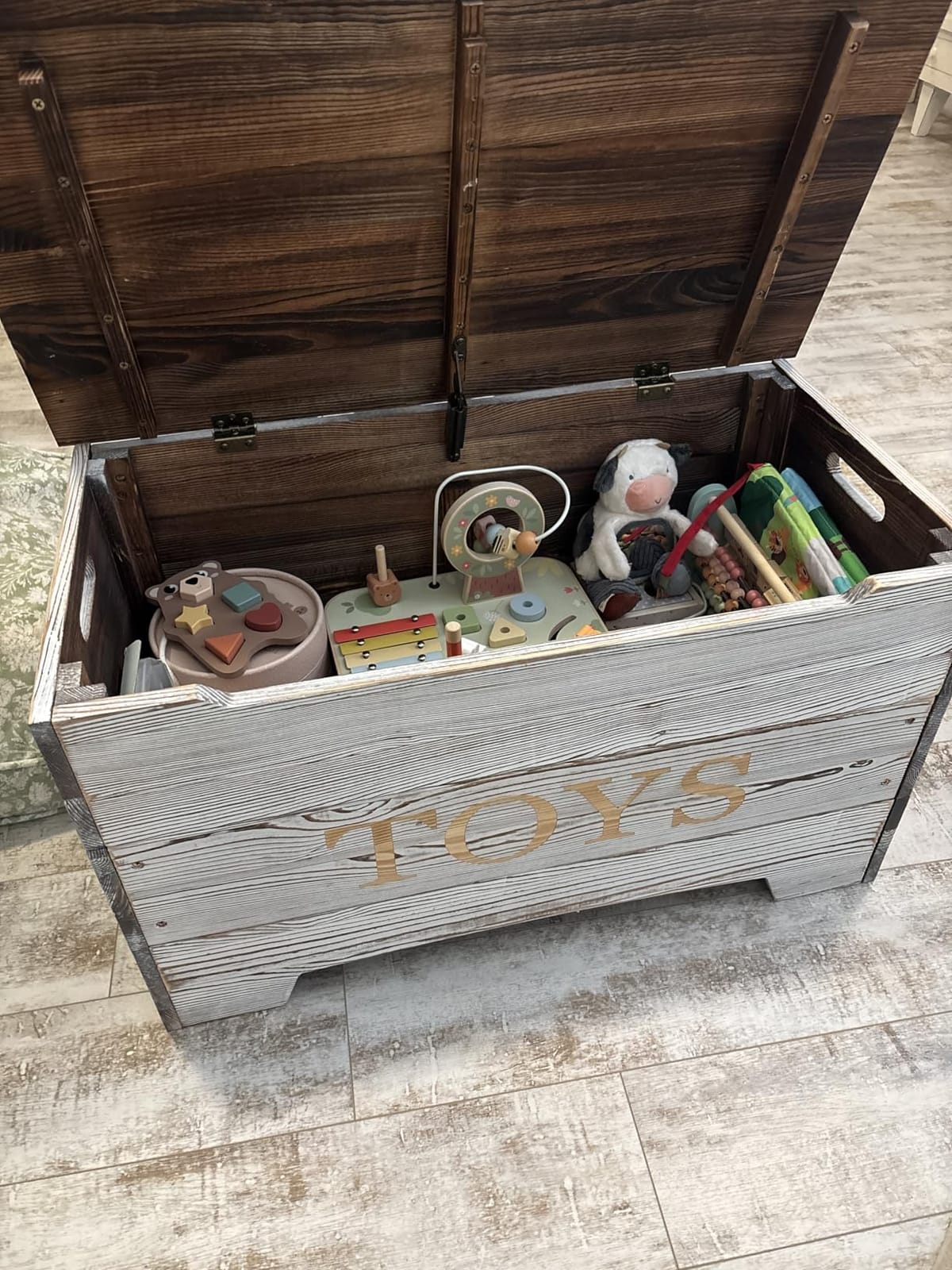 Badger Basket Farmhouse Wooden Toy Box - Rustic Storage Chest for Kids with Reversible Toys Panel, Safety Hinge Lid, Front Slot - Caramel Brown customer photo 1