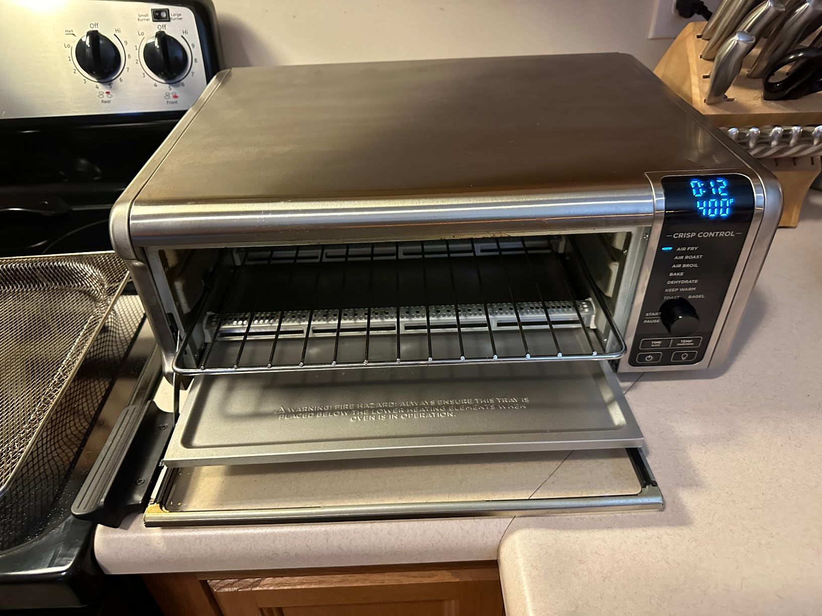 Ninja Digital Air Fry Countertop Oven, 8-in-1, XL, Silver, SP101 | Air fry, air roast, broil, bake, toast, bagel, dehydrate, keep warm, 1800W, Flip up & away customer photo 1
