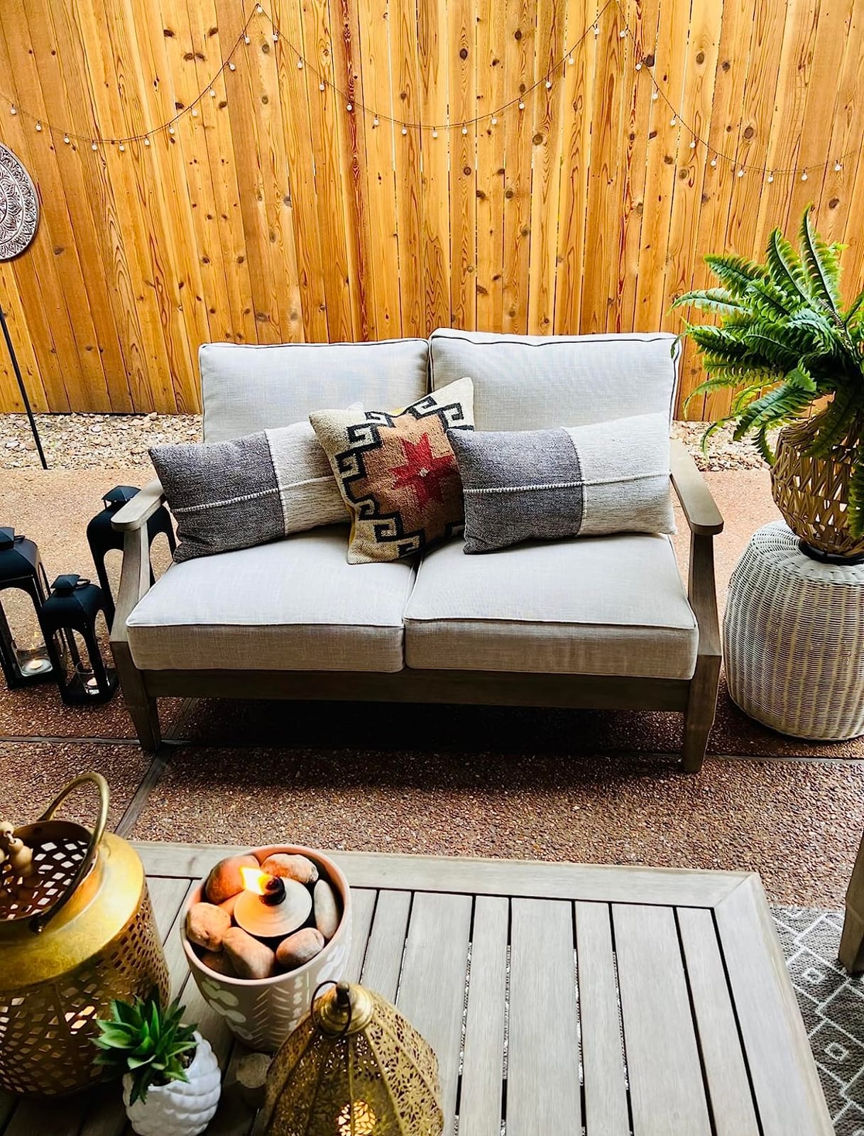 Signature Design by Ashley Gerianne Outdoor Coffee Table, Eucalyptus Wood With 5‑Step Protective Finish & Slatted Top for Rain Shedding, Durable for Outside Patio Use, Brown customer photo 1