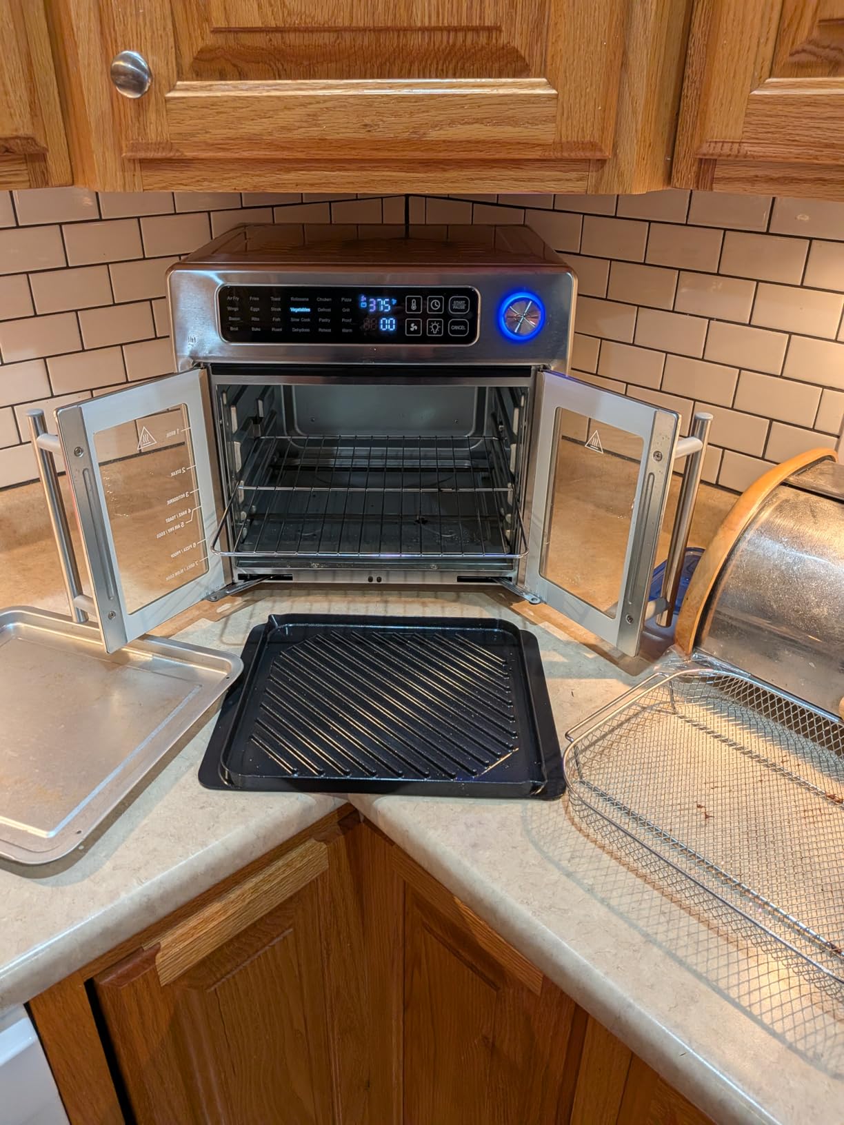 Emeril Lagasse 26QT French Door Multi-Function Air Fryer Toaster Oven | 26QT air fryer oven with French doors, 24 cooking functions, dual-speed fan and rotisserie for easy family meals. customer photo 2