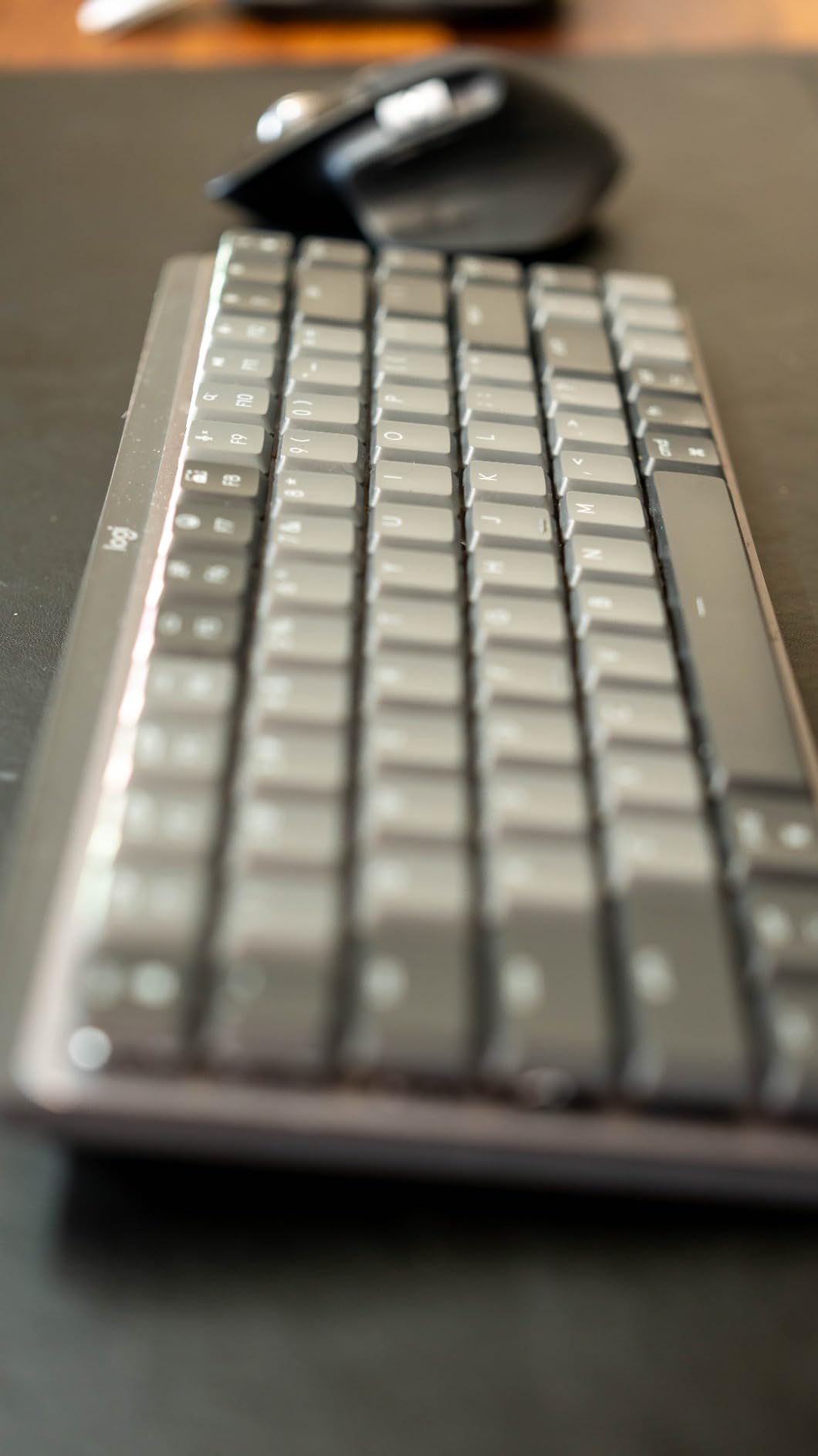 Logitech MX Mechanical Mini Mac Wireless Keyboard Low-Profile - Space Grey | Tactile quiet mechanical switches, Smart backlit keys, Bluetooth pairs with 3 devices, USB-C rechargeable, 15 days customer photo 1