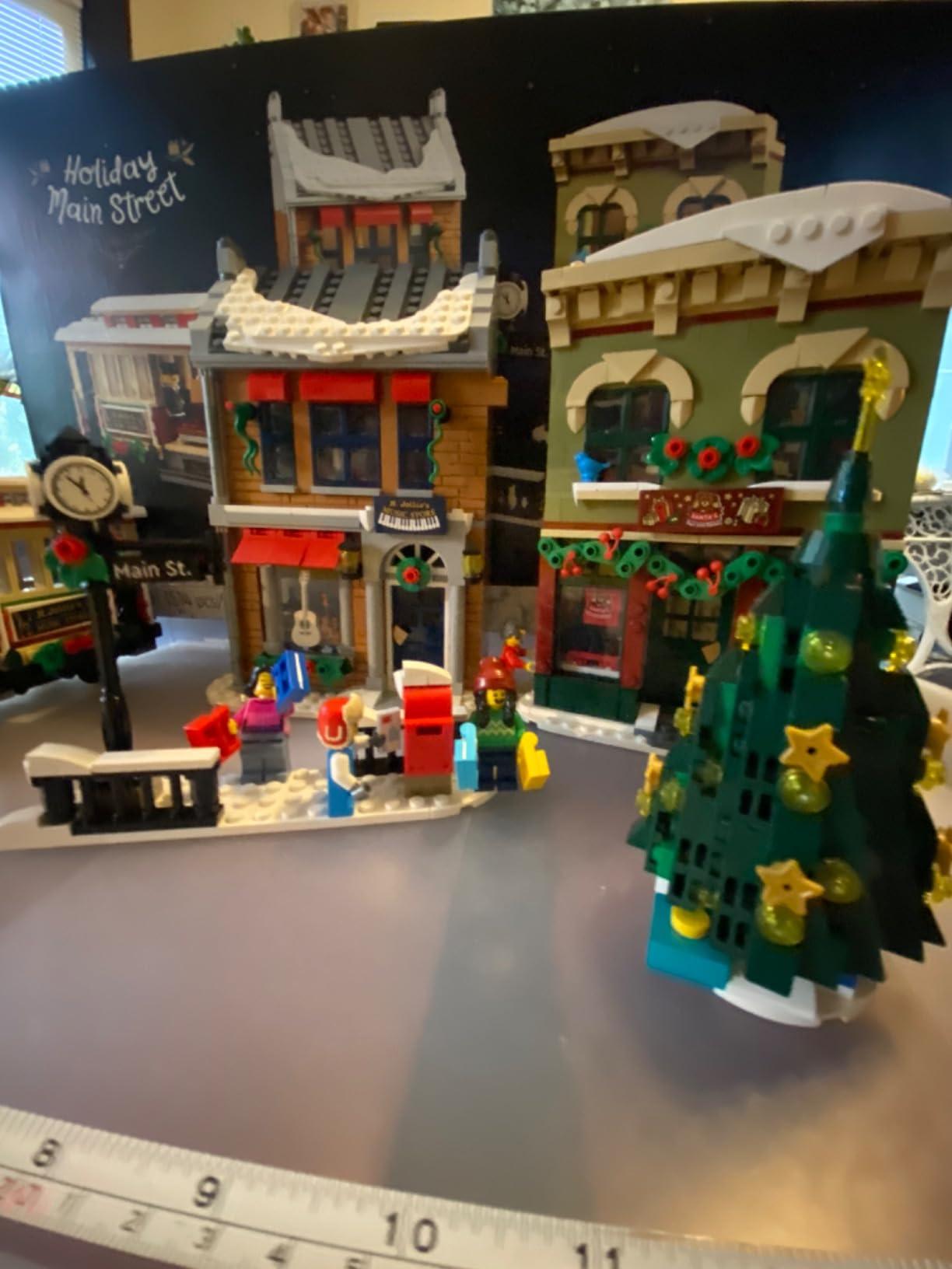 LEGO Holiday Main Street Building Kit, Christmas Village Adult Set for Families, Holiday Display Set with Shops, Streetcar and 6 Minifigures, Christmas Decoration to Build Together, 10308 customer photo 2