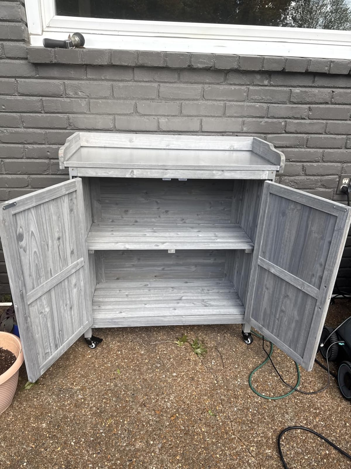 Yaheetech Rolling Potting Bench Outdoor Storage Cabinet, Metal Top, Brown | Fir wood cabinet with shelves hides garden and grill gear, its metal top suits potting, and locking wheels roll it anywhere. customer photo 2