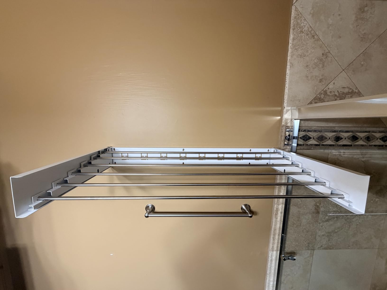 Vikaqi Wall Mounted Clothes Drying Rack 40 inches, Foldable Wall Mount Laundry Rack Folding Indoor, Drying Rack Clothing Collapsible, Hidden Space Saver with Wall Template, 6 Rods, White customer photo 1
