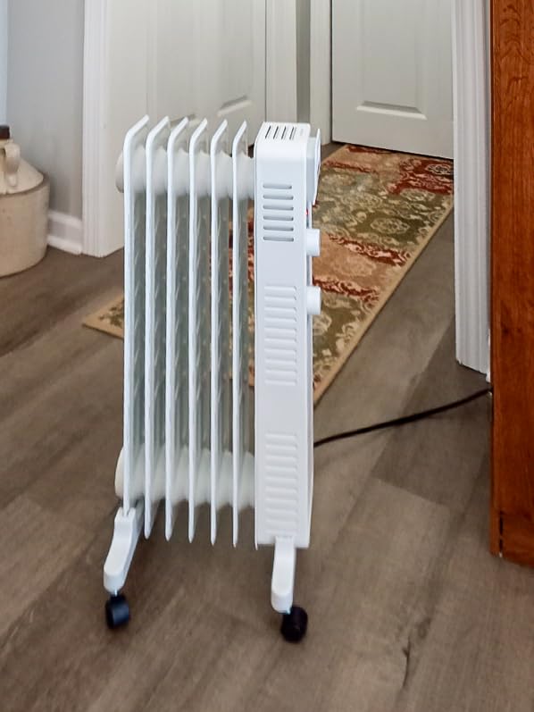 Pelonis Oil Filled Radiator Heater for Large Space, 2025 Upgraded, 1500W Quiet Warmth Radiant Heater, 3 Heating Modes, Overheat & Tip-Over Protection, Adjustable Thermostat, Black customer photo 1