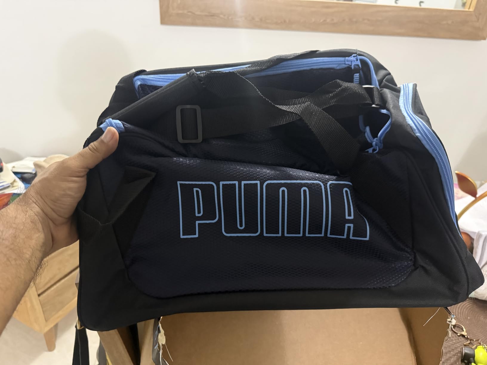 PUMA unisex-adult Form Factor Duffel with Adjustable Strap, Padded Bottom & Zip Pockets customer photo 1